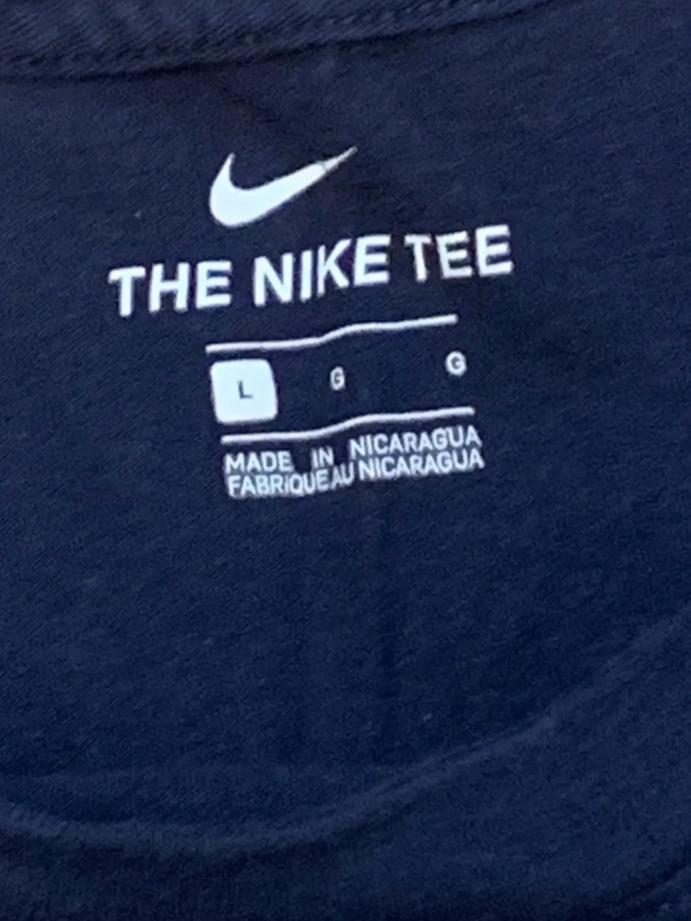Nike Men's Navy Blue Short Sleeve Tee with Light Blue Logo